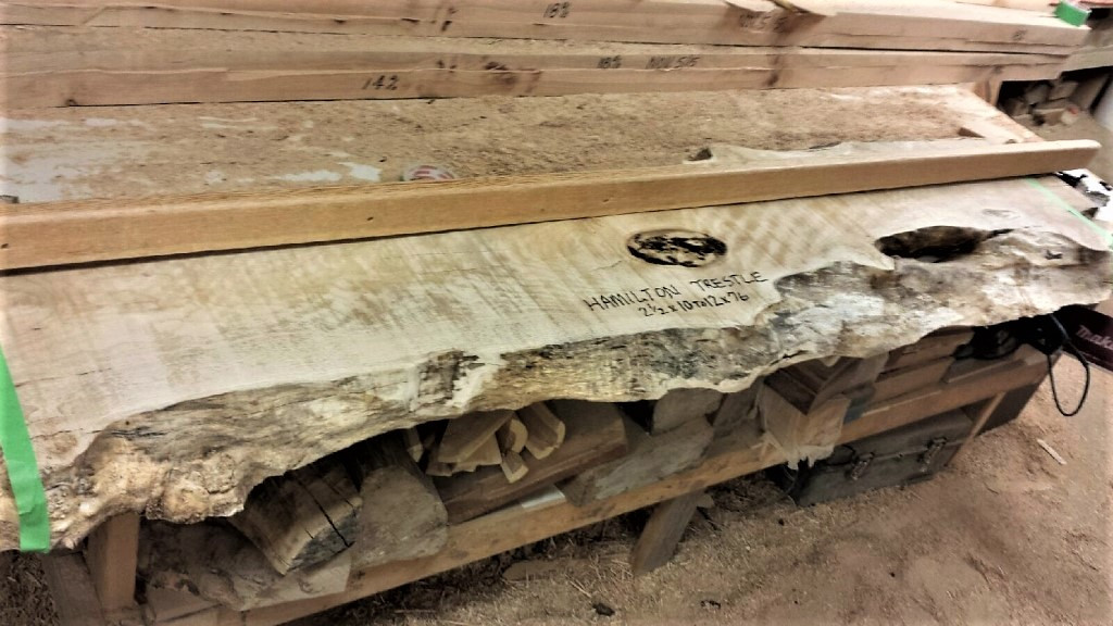 Custom wood fireplace mantel with rustic finish in Surrey