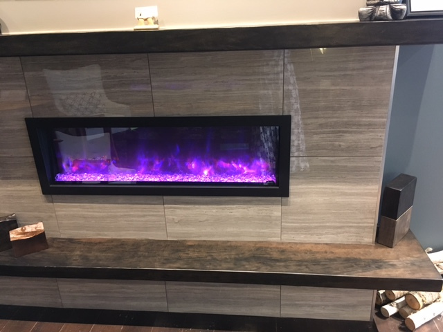 Modern tile fireplace surround in Vancouver condo